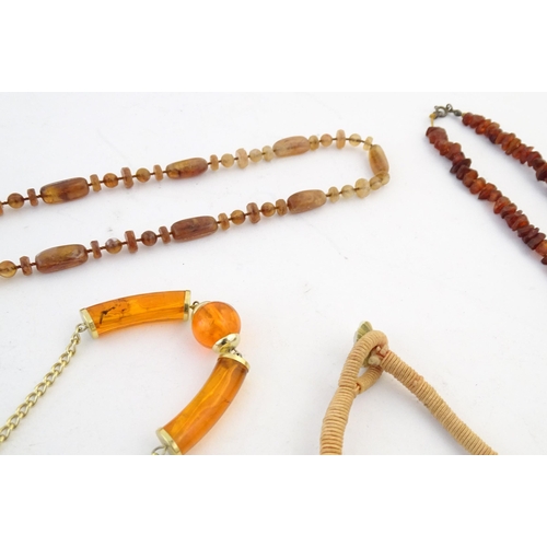 760 - A quantity of assorted bead necklaces to include some amber examples.