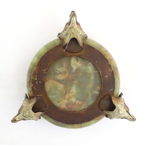 1009 - A 20thC green agate dish on an Austrian cold painted base with fox head detail. The stand marked Mad... 