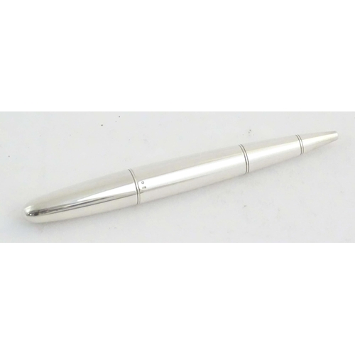 1152 - A cased silver Dunhill 'Torpedo' combination ballpoint & fountain dipping pen, hallmarked 2000 Londo... 