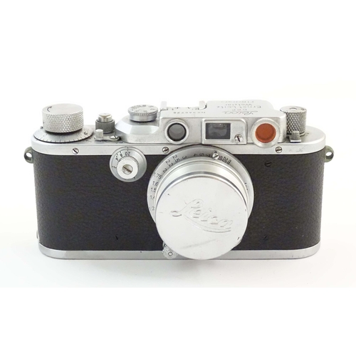 1162 - A c1930s cased Leica 3B 50mm film camera, serial number 346728, fitted with an Leitz Elmar f=5cm len... 