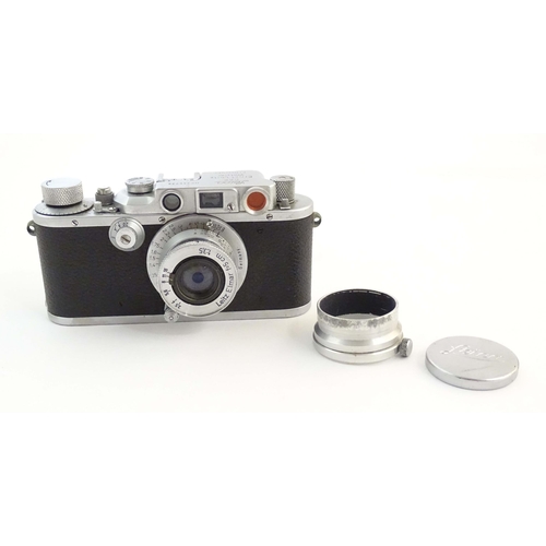 1162 - A c1930s cased Leica 3B 50mm film camera, serial number 346728, fitted with an Leitz Elmar f=5cm len... 