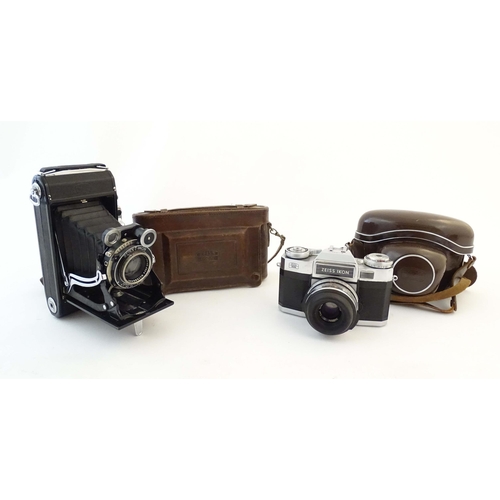 1165 - A quantity of 20thC film cameras and equipment, comprising: a Canon 8-2 cinecamera, a cased Braun Pa... 