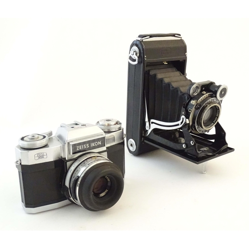 1165 - A quantity of 20thC film cameras and equipment, comprising: a Canon 8-2 cinecamera, a cased Braun Pa... 