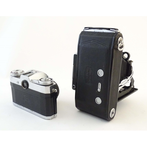 1165 - A quantity of 20thC film cameras and equipment, comprising: a Canon 8-2 cinecamera, a cased Braun Pa... 