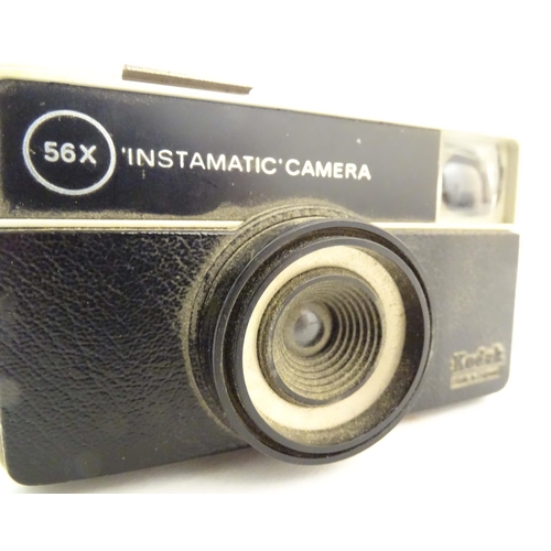 1166 - A quantity of 20thC cameras, comprising: a Pentax ME Super SLR 35mm film camera (fitted with a Mitak... 