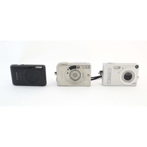 1166 - A quantity of 20thC cameras, comprising: a Pentax ME Super SLR 35mm film camera (fitted with a Mitak... 