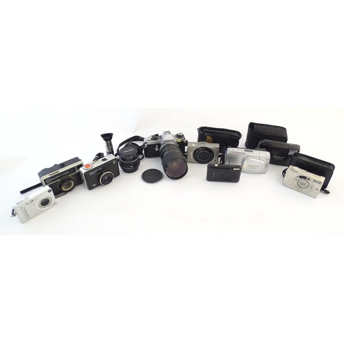 1166 - A quantity of 20thC cameras, comprising: a Pentax ME Super SLR 35mm film camera (fitted with a Mitak... 