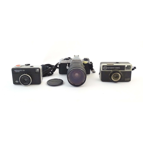 1166 - A quantity of 20thC cameras, comprising: a Pentax ME Super SLR 35mm film camera (fitted with a Mitak... 