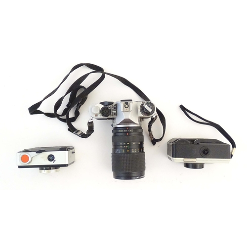 1166 - A quantity of 20thC cameras, comprising: a Pentax ME Super SLR 35mm film camera (fitted with a Mitak... 