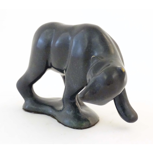 1171 - A limited edition no. 172/1000 cast and patinated model of a bear by American sculptor Robert Deurlo... 