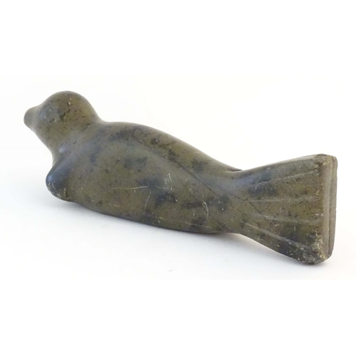 1172 - A 20thC Canadian Inuit carved soapstone model of a seal. Approx. 13 1/2