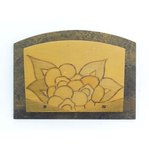 1175 - An early 20thC wall hanging letter rack and ink blotter with incised flower decoration. Letter rack ... 