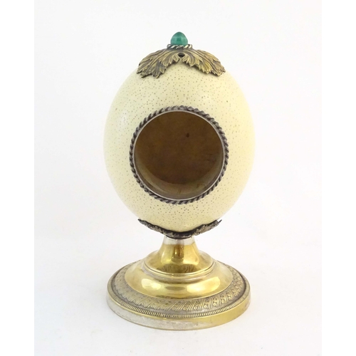 1188 - A late 19th / early 20thC mounted ostrich egg clock case in the manner of Anthony Redmile, with a si... 