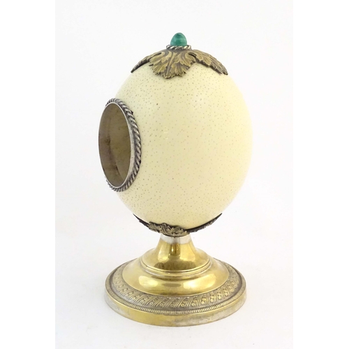 1188 - A late 19th / early 20thC mounted ostrich egg clock case in the manner of Anthony Redmile, with a si... 