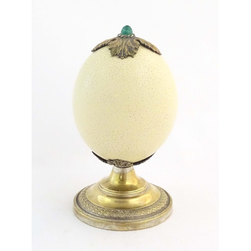 1188 - A late 19th / early 20thC mounted ostrich egg clock case in the manner of Anthony Redmile, with a si... 