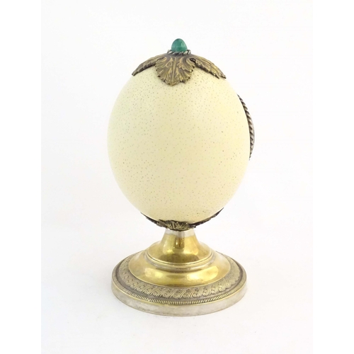 1188 - A late 19th / early 20thC mounted ostrich egg clock case in the manner of Anthony Redmile, with a si... 