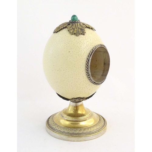 1188 - A late 19th / early 20thC mounted ostrich egg clock case in the manner of Anthony Redmile, with a si... 