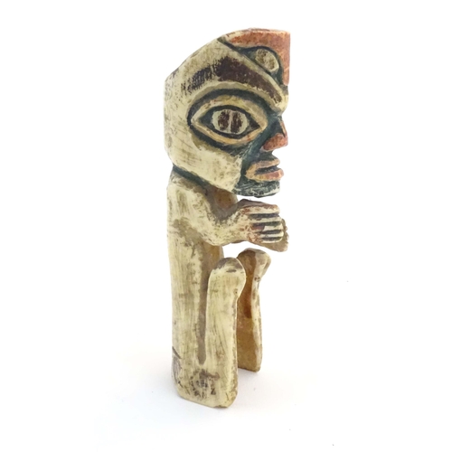 1189 - A North American carved bone figure with polychrome decoration. Possibly Haida / Tlingit. Approx. 5 ... 