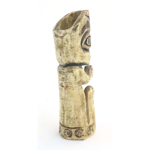 1189 - A North American carved bone figure with polychrome decoration. Possibly Haida / Tlingit. Approx. 5 ... 