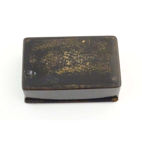 1199 - A 19thC lacquered snuff box with a hinged lid. Approx. 2 1/4