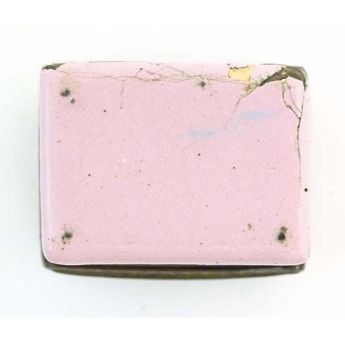 1203 - A 19thC Bilston / Battersea enamel patch box of rectangular form with a waisted body, the lid decora... 