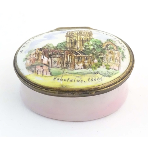 1204 - A 19thC Bilston / Battersea enamel pill box of oval form, the lid decorated with a hand painted view... 