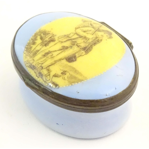 1205 - A 19thC Bilston / Battersea enamel patch box of oval form, the lid decorated with a huntsman and his... 