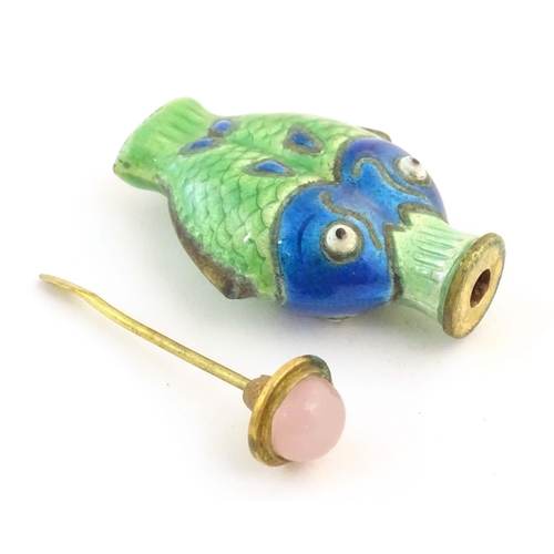 1220 - A 20thC snuff bottle with enamel fish decoration with rose quartz cabochon to lid. Approx. 2 3/4