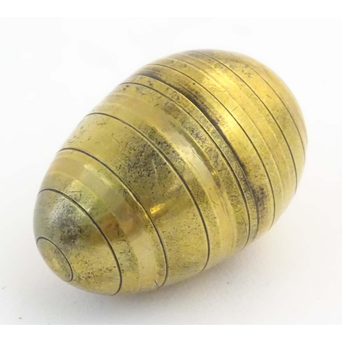 1226 - A Victorian novelty brass sewing / needlework keep / case modelled as an egg with banded detail, ope... 