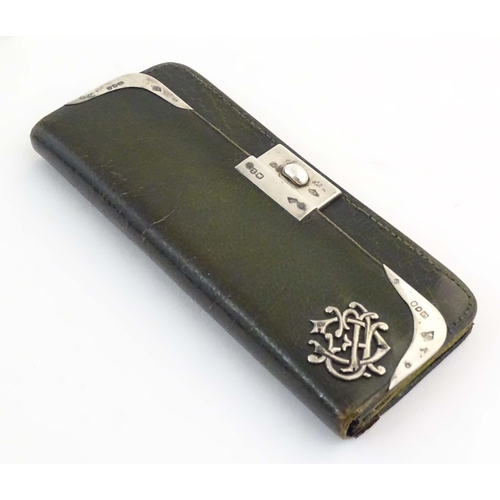 1229 - A Victorian green leather purse of rectangular form retailed by Mappin Brothers, 66 Cheapside, with ... 