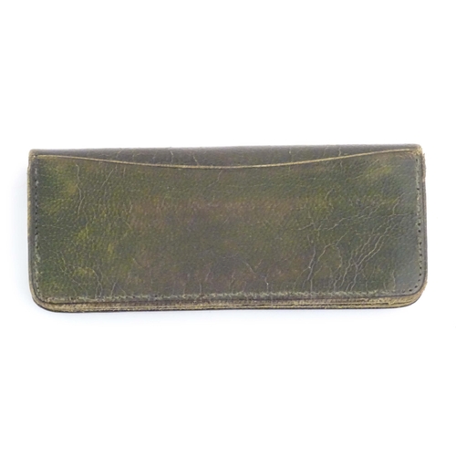 1229 - A Victorian green leather purse of rectangular form retailed by Mappin Brothers, 66 Cheapside, with ... 