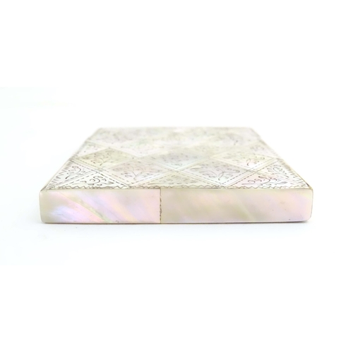 1230 - A Victorian mother of pearl card case with floral and foliate decoration. Approx. 4