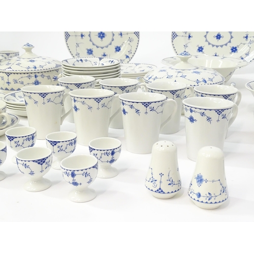 205 - A quantity of blue and white tea and dinner wares in the pattern Denmark / Blue Denmark with floral ... 