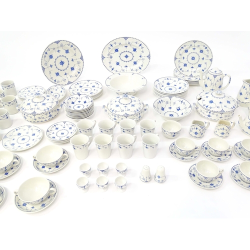 205 - A quantity of blue and white tea and dinner wares in the pattern Denmark / Blue Denmark with floral ... 