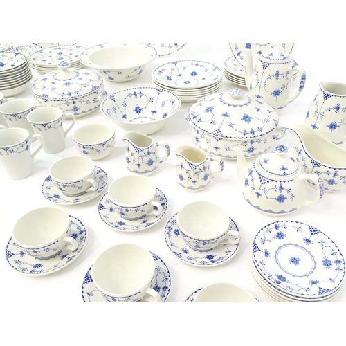 205 - A quantity of blue and white tea and dinner wares in the pattern Denmark / Blue Denmark with floral ... 