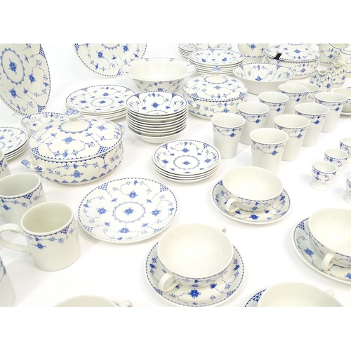 205 - A quantity of blue and white tea and dinner wares in the pattern Denmark / Blue Denmark with floral ... 