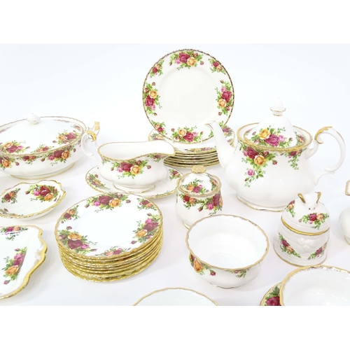 206 - A large quantity of Royal Albert tea and dinner wares in the Old Country Roses pattern comprising di... 