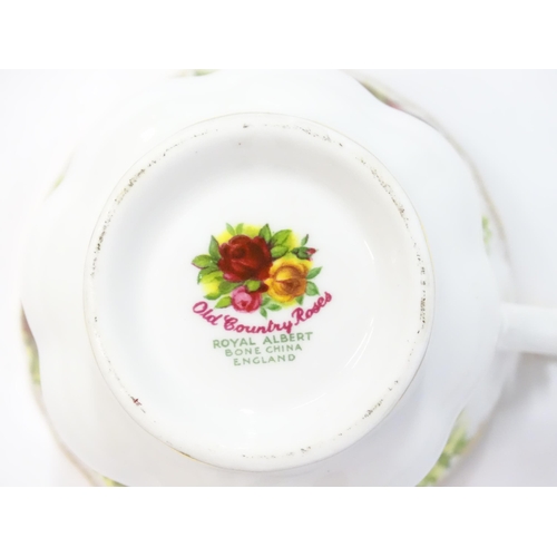 206 - A large quantity of Royal Albert tea and dinner wares in the Old Country Roses pattern comprising di... 