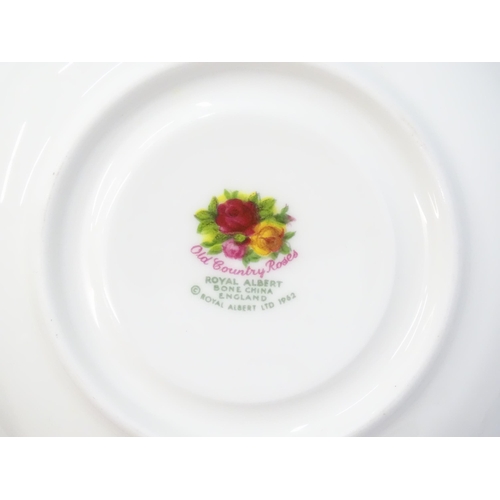 206 - A large quantity of Royal Albert tea and dinner wares in the Old Country Roses pattern comprising di... 