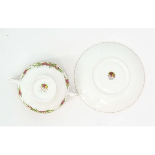 206 - A large quantity of Royal Albert tea and dinner wares in the Old Country Roses pattern comprising di... 