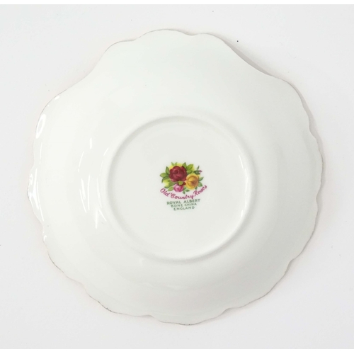 206 - A large quantity of Royal Albert tea and dinner wares in the Old Country Roses pattern comprising di... 