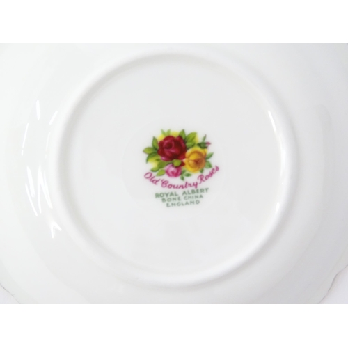 206 - A large quantity of Royal Albert tea and dinner wares in the Old Country Roses pattern comprising di... 