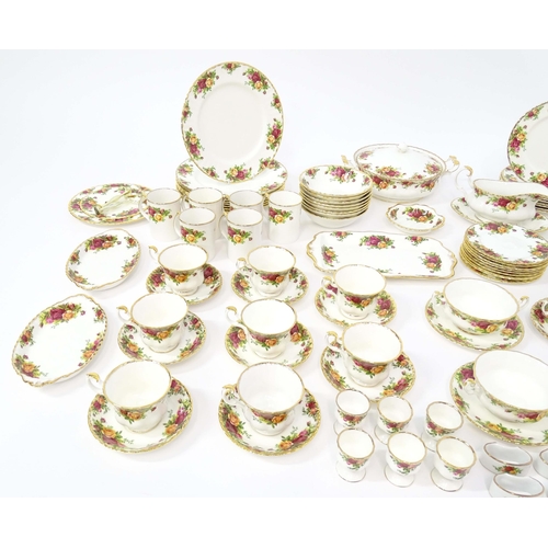 206 - A large quantity of Royal Albert tea and dinner wares in the Old Country Roses pattern comprising di... 