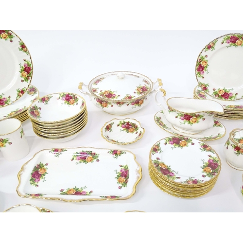 206 - A large quantity of Royal Albert tea and dinner wares in the Old Country Roses pattern comprising di... 