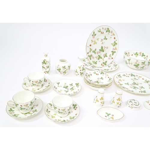 213 - A quantity of Wedgwood tea and dinner wares in the Wild Strawberry pattern, to include plates, teapo... 