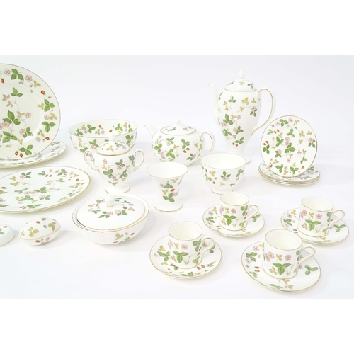 213 - A quantity of Wedgwood tea and dinner wares in the Wild Strawberry pattern, to include plates, teapo... 