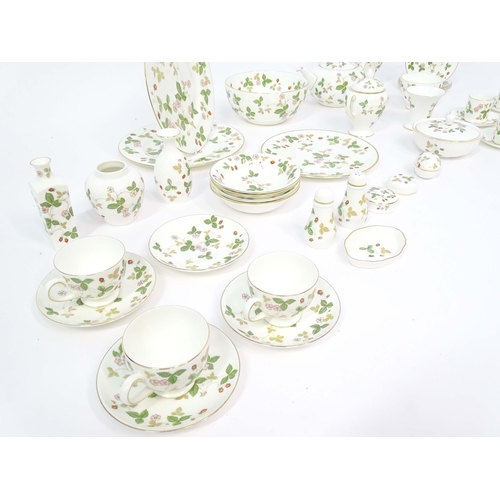 213 - A quantity of Wedgwood tea and dinner wares in the Wild Strawberry pattern, to include plates, teapo... 