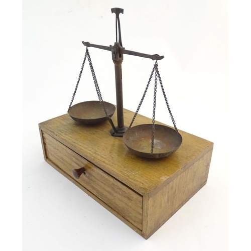 1250 - A pair of early - mid 20thC portable jeweller's scales, the brass stand, beam and pans removing for ... 