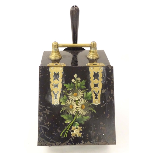 2091 - A late 19thC tin coal scuttle, with brass handle and hinges, in black painted finish, the lid decora... 