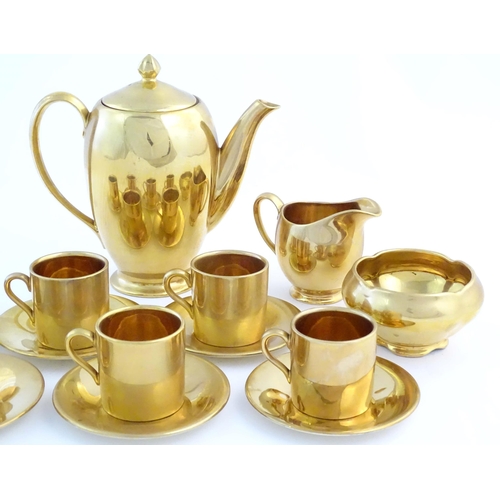 215 - A quantity of Royal Winton / Grimwades coffee wares with gilt glaze, to include coffee pot, milk jug... 